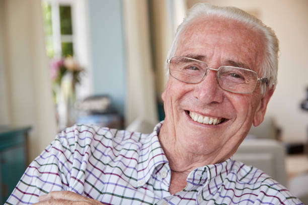 istock Happy senior man at home smiling to camera, close up 849182222
