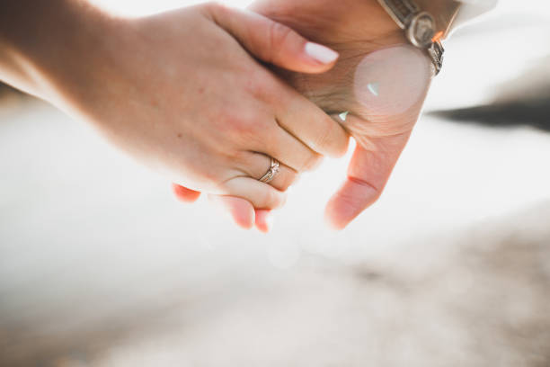 istock Wedding couple bride and groom holding hands 849182522
