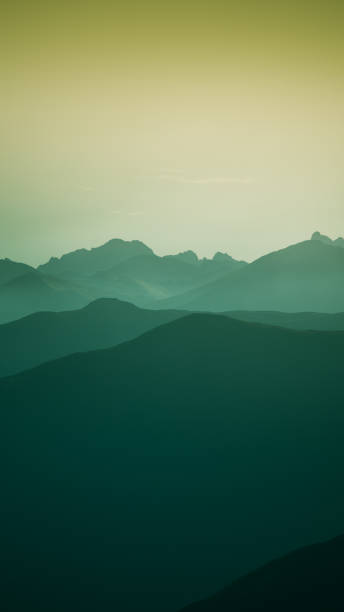 An inspiring mountain landscape in Tatry, Slovakia. Vivid, gradient scenery with perspective in warm green tone. Summer in mountains. Nature wallpaper in bright colors. A beautiful vertical wallpaper for a smartphone. Vertical image for a mobile use. un inspirador paisaje de montaña en tatry, eslovaquia. vivo, degradado el paisaje con perspectiva en tono verde cálido. verano en las montañas. fondo de pantalla de naturaleza en colores brillantes. un hermoso fondo de pantalla vertical para un smartphone. vertical de la imagen para un uso móvil.