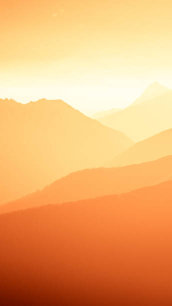 An inspiring mountain landscape in Tatry, Slovakia. Vivid, gradient scenery with perspective in red tone. Summer in mountains. Nature wallpaper in bright colors. A beautiful vertical wallpaper for a smartphone. Vertical image for a mobile use. un inspirador paisaje de montaña en tatry, eslovaquia. vivo, degradado el paisaje con perspectiva en tono rojo. verano en las montañas. fondo de pantalla de naturaleza en colores brillantes. un hermoso fondo de pantalla vertical para un smartphone. vertical de la imagen para un uso móvil.