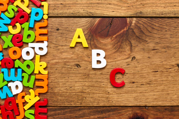 istock Overhead view of ABC by colorful alphabets on wood background 849189376