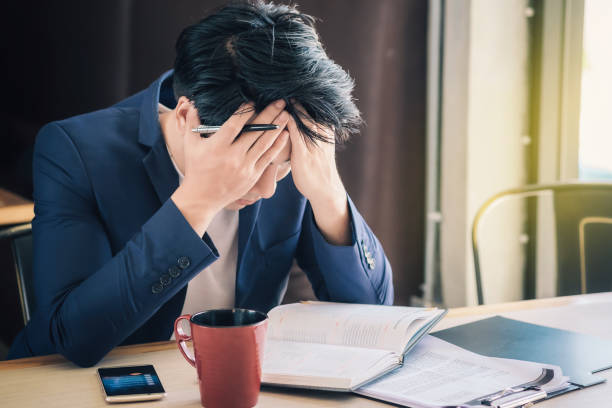 istock Stressed businessmen have problems and headaches with failure in what to expect. 849192514