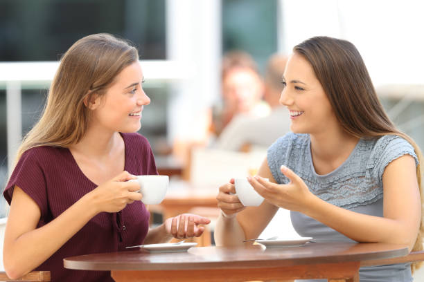 istock Happy friends having a conversation in a bar 849196464
