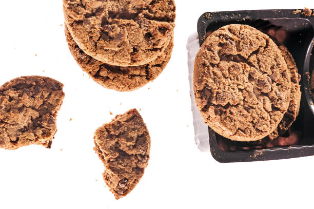 istock Chocolate cookies close up isolated on white background. 849202436