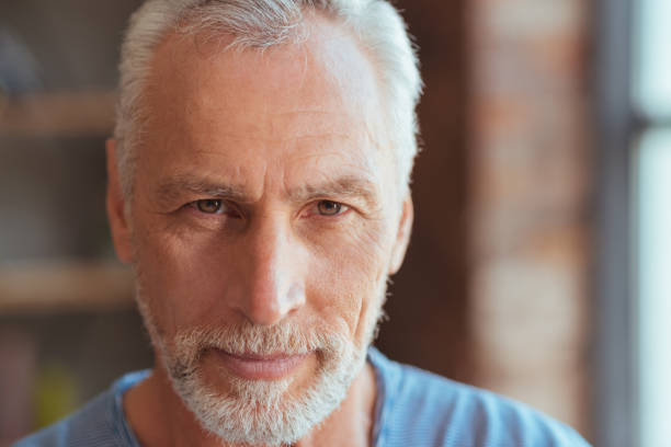 istock Portrait of a cheerful aged man sharing gladness 849203706