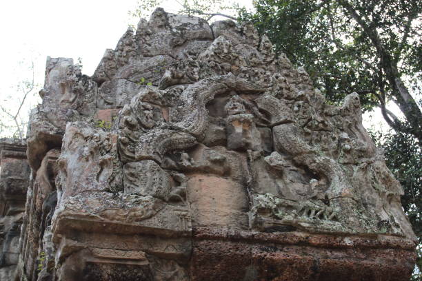istock A beautiful ancient sculpture on the wall of a Cambodian Buddhist temple from Angkor complex, near the antique city of Siem Reap. 849203722
