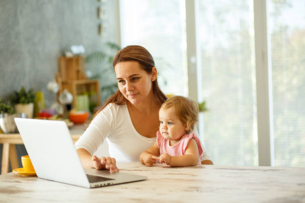 istock Woman working at home 849208216