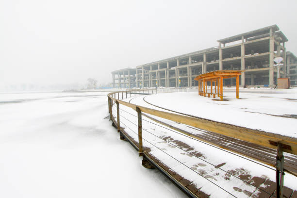 istock buildings and railing in the snow, at a construction site 849211220