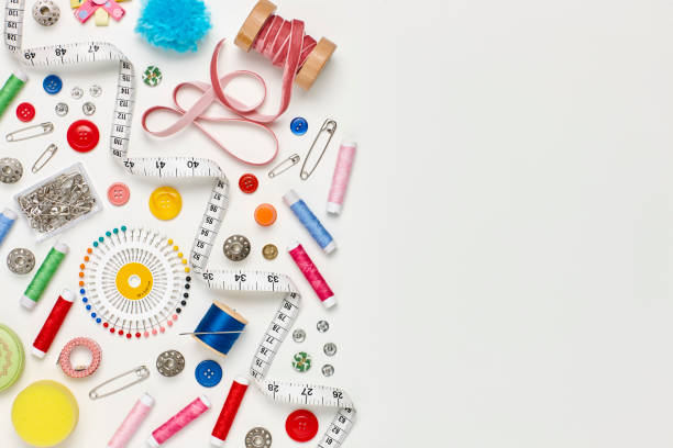 istock Overhead flat lay of colorful sewing items on white background 849212410