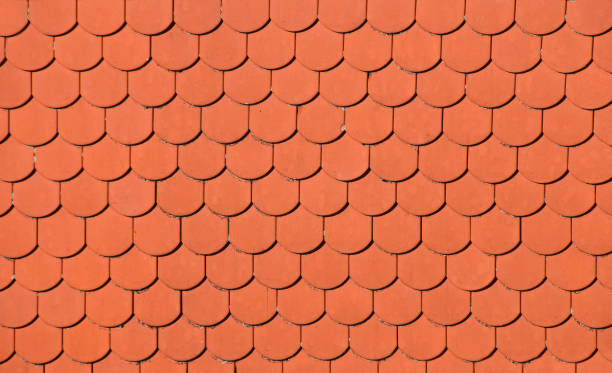istock Red brown ceramic roof tiles pattern background 849215292