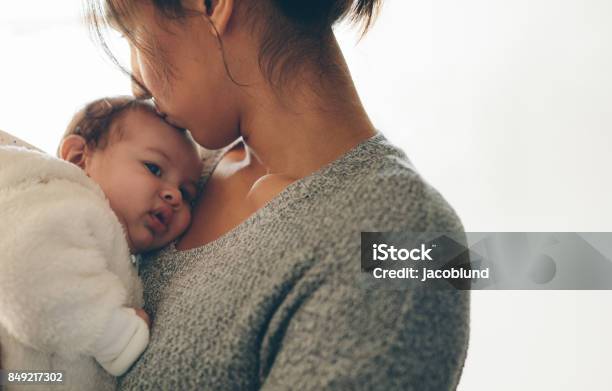 Newborn Baby Boy In His Mothers Arms Stock Photo - Download Image Now - Mother, Baby - Human Age, Newborn