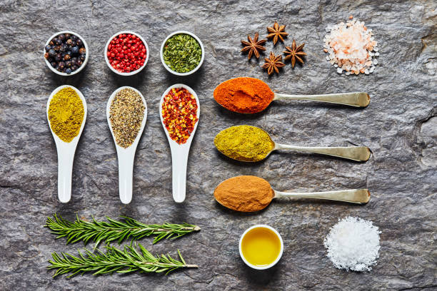 istock Flat lay of Indian herbs and spices on slate background 849220664