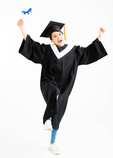 istock Happy graduation student dancing and showing diploma 849230722