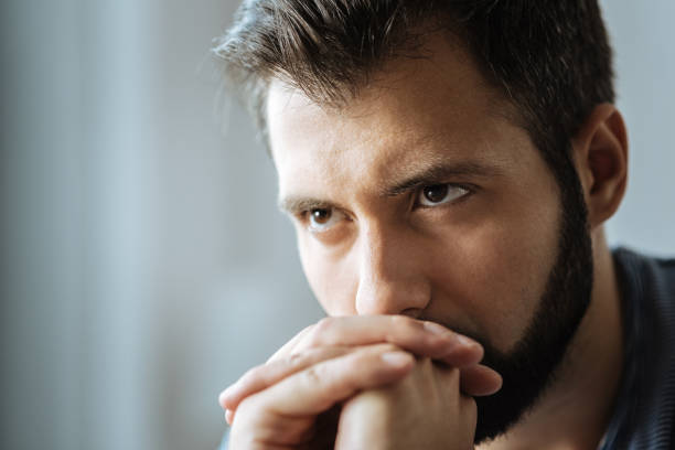 istock Portrait of an unhappy thoughtful man 849238156