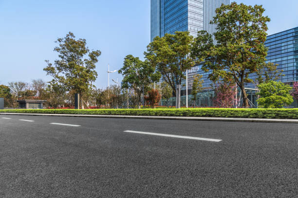 istock City empty road with modern buildings background 849242872