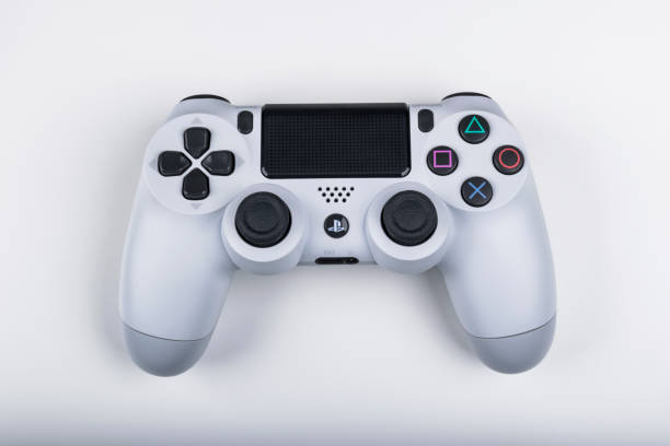 Sony PlayStation 4 game console with a joystick dualshock 4,  home video game console developed by Sony Interactive Entertainment. stock photo