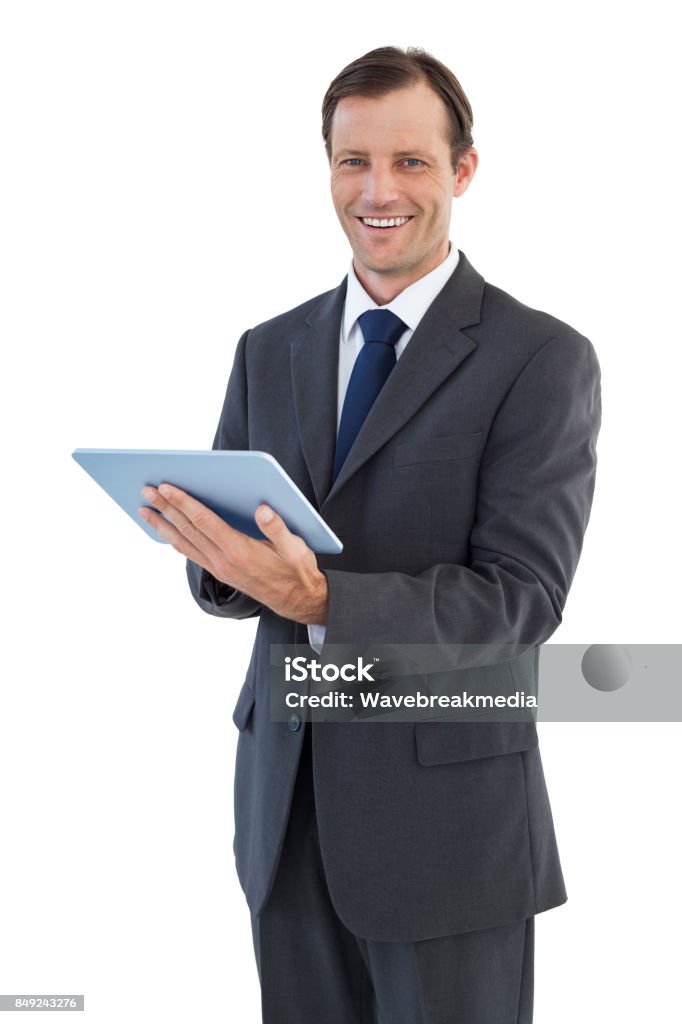 Smiling businessman holding a tablet computer Smiling businessman holding a tablet computer on white background 40-44 Years Stock Photo