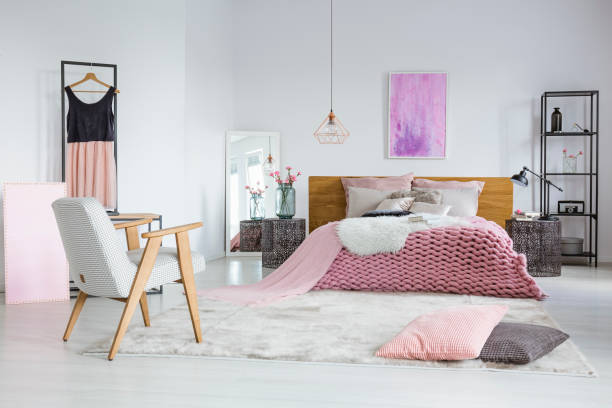 istock Feminine bedroom with woolen blanket 849243308