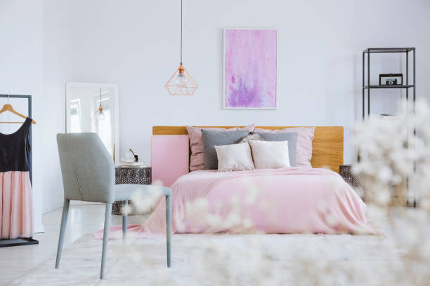 istock White flowers in pink bedroom 849243364