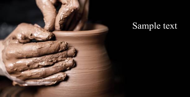 Pottery. Hands of potter making clay pot, closeup photo clay stock pictures, royalty-free photos & images