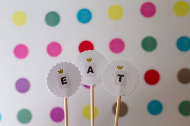 istock Toppers for cake decoration on polka dot backstage 849249974
