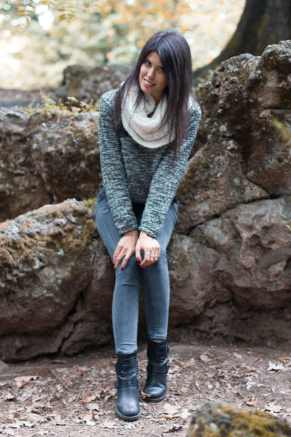 istock Beautiful girl in the park 849250294