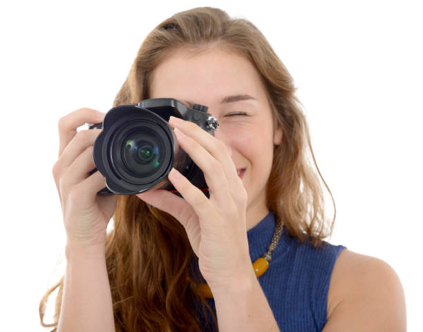 istock Beautiful smiling woman with digital camera. Isolated on white background 849254244