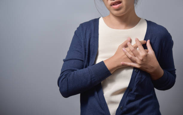 istock woman having chest pain. 849255470