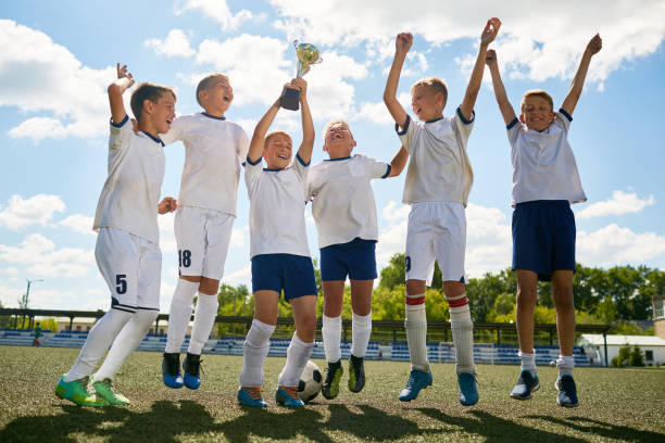 istock Junior Football Team Celebrating Victory 849258936