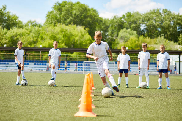 istock Junior Football Team at Practice 849258948