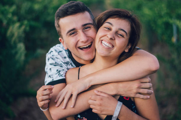 istock Young couple having fun at sunset 849268646