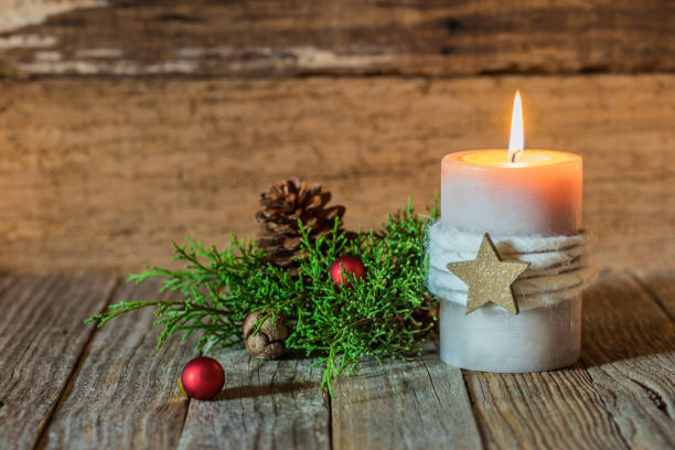 istock Christmas decoration with burning candle 849271422