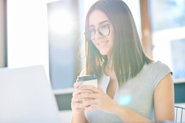 istock Cheerful woman working in morning 849273970
