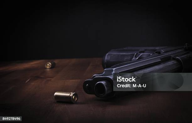 Dark Crime Scene Stock Photo - Download Image Now - Gun, Blood, Bullet