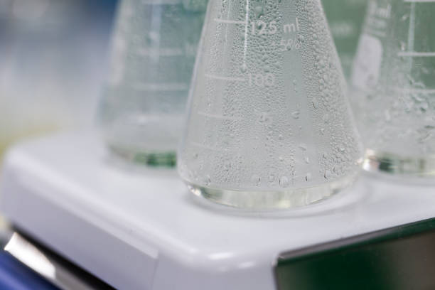 istock Experiment chemical solution mixing liquids on a Hotplate Stirrer in Lab. 849278812