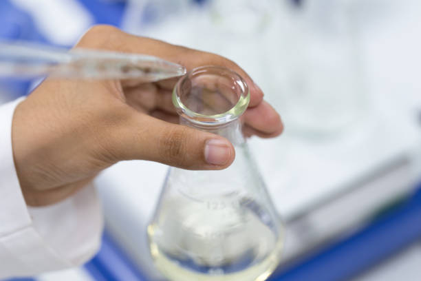 istock Experiment chemical solution mixing liquids on a Hotplate Stirrer in Lab. 849279080