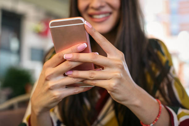 istock Happy woman using smart phone. Close up. 849286548
