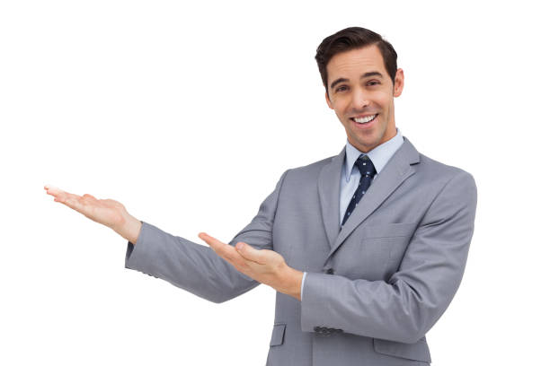 istock Happy young businessman giving a presentation with his hands 849293416