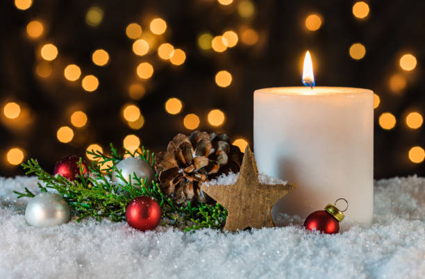 istock Christmas decoration with burning candle 849298916