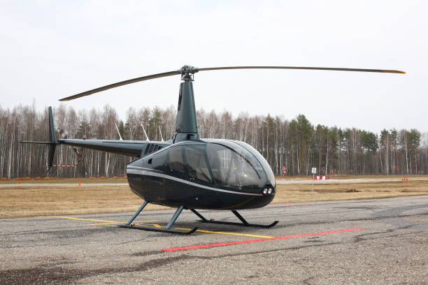 istock Aircraft - dark green small helicopter 849306902