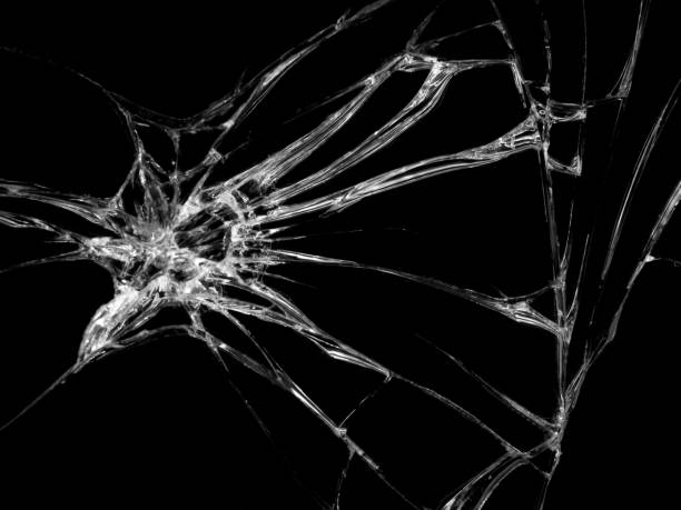 istock Cracked glass texture on black background 849312300