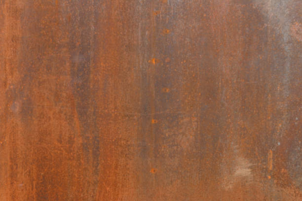 istock Old rusty metal painted with red paint 849316458