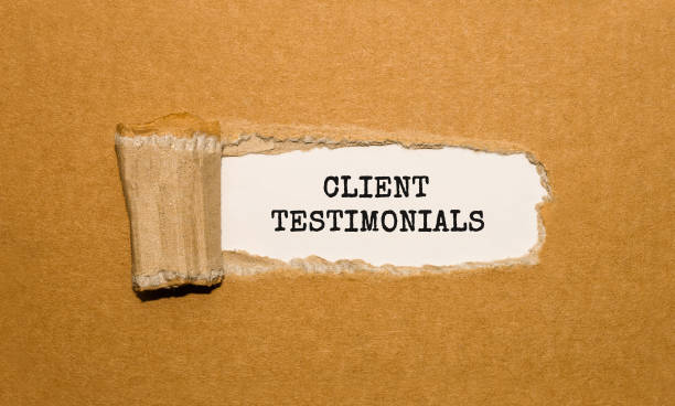 istock The text CLIENT TESTIMONIALS appearing behind torn brown paper 849341478