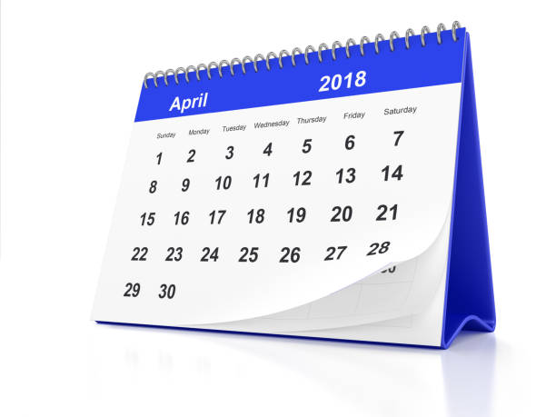 istock April 2018 Blue Plastic Framed Desktop Calendar on White Background 849355970