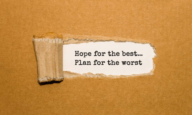 istock The text Hope for the best Plan for the worst appearing behind torn brown paper 849361290