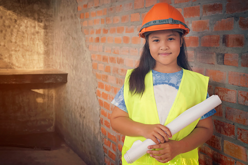 Cute girl dress up as a engineer Grow up or be a construction worker