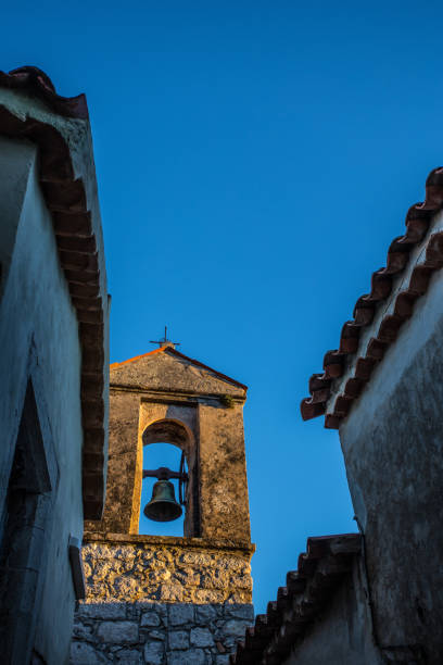 istock The tower bell church in a blue sky background 849368360