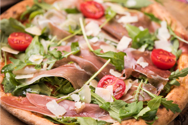 istock Italian prosciutto and rucola pizza. 849384442