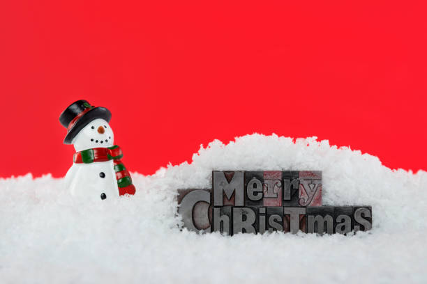 istock Merry Christmas letterpress snowman 849396140