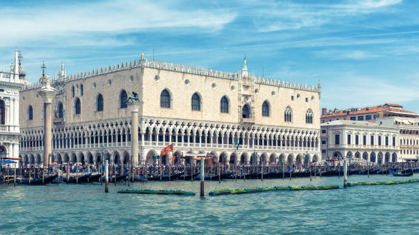 Saint Mark`s Square with Doge`s Palace, or Palazzo Ducale, in Venice, Italy. This place is the main tourist destination in Venice. 16:9 widescreen.